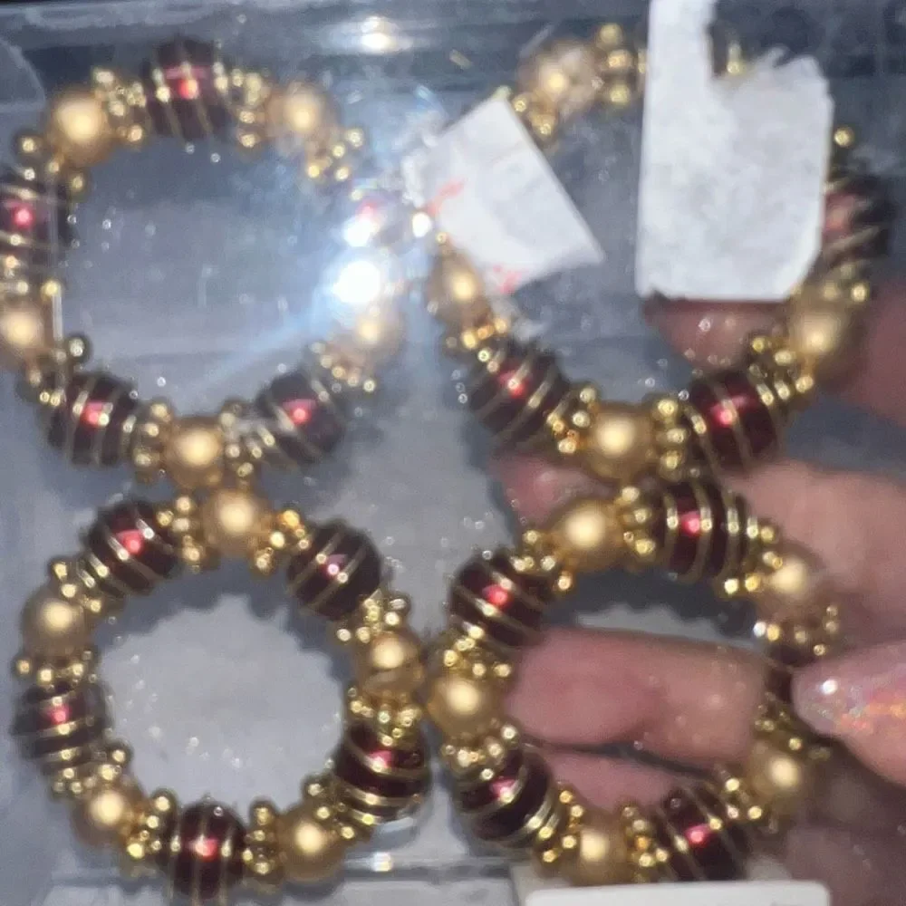 Set of Four Gold and Red Beaded Napkin Holders